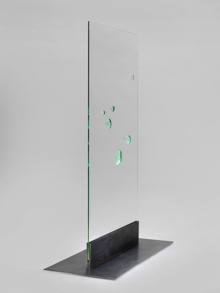 photos of a glass panel with a steel base