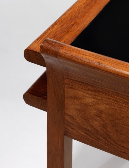 Detail of wood and glass desk top