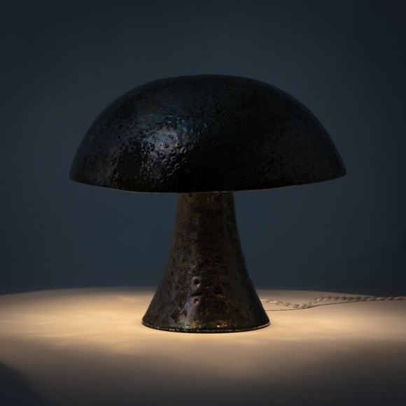 Illuminated lamp with a silvered raku glaze