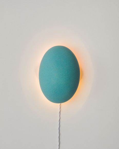 sconce on a gray wall