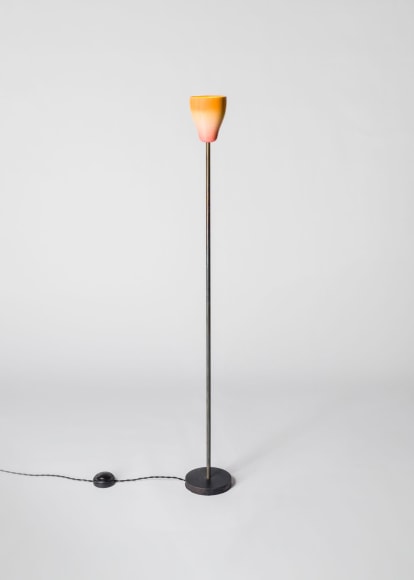 minimal orange lamp in an empty rom