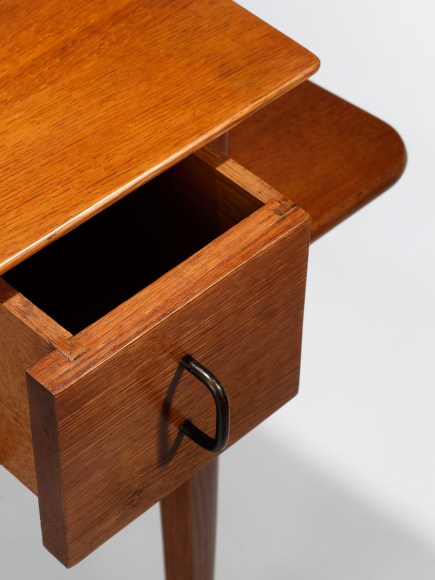 Wooden drawer in front a white background