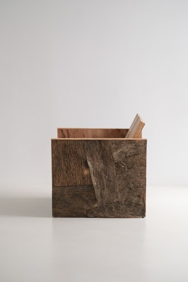 Cork and oak tree chair in a boxy shape by made in situ.