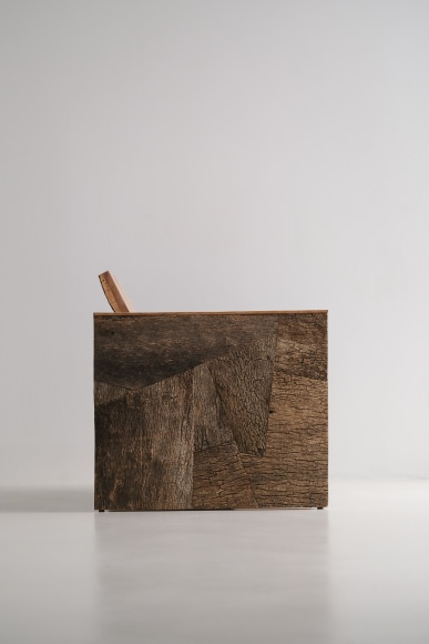 Cork and oak tree chair in a boxy shape by made in situ.