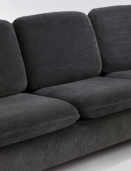 Upholstered sofa detail of middle seat