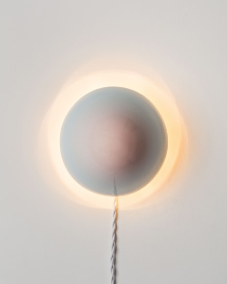 sconce on a gray wall