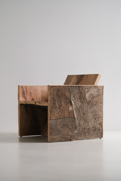 Cork and oak tree chair in a boxy shape by made in situ.