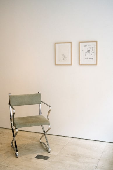 Interior view of unique Maria Pergay sketches installed beside&nbsp;Chaise X / X Chair with Arms, 1975/2017. Photo by Adrianna Glaviano