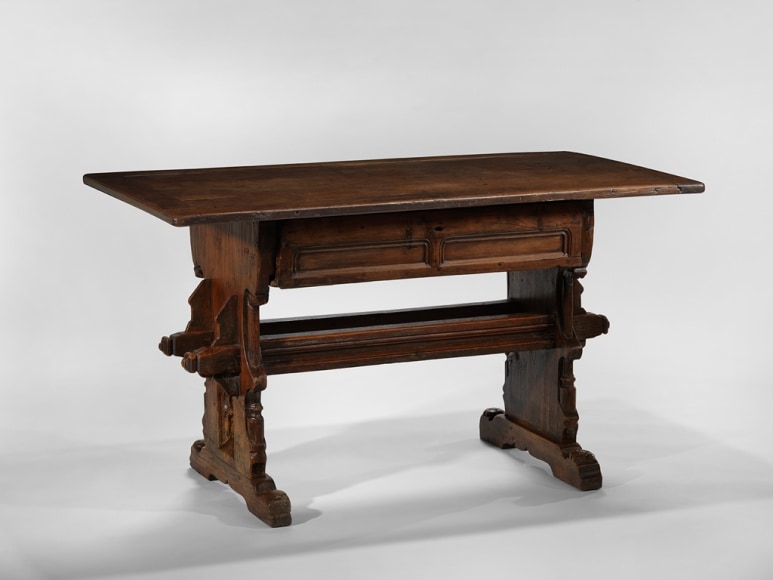 picture of medieval table in a gray room