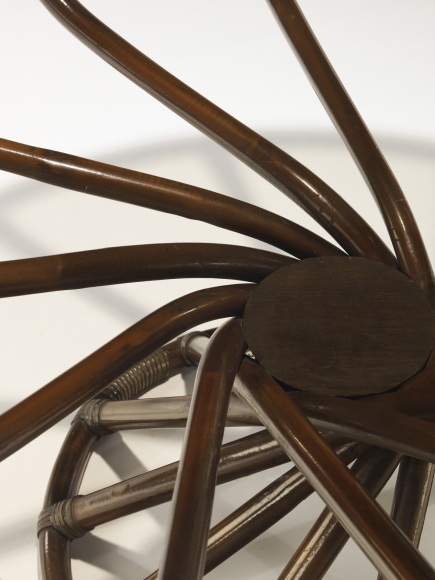 Detail of glass topped rattan low table by Bernard Govin