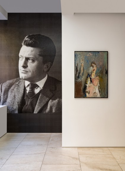Installation view of image of Joseph-André Motte and painting by Eugène Leroy Portrait Rose/Bleu, 1956.