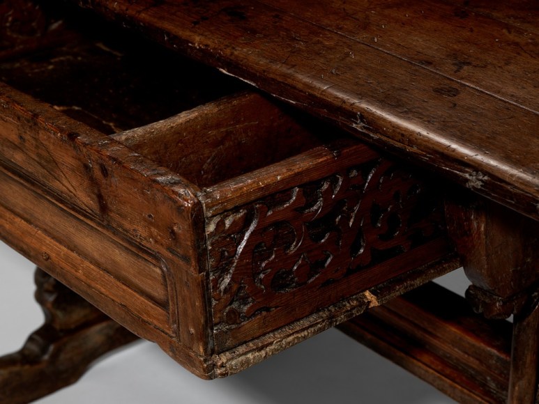 picture of medieval table in a gray room