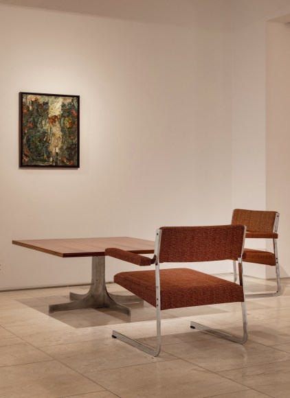 Installation view of painting by Eugène Leroy, Untitled, 1968 installated above Joseph-André Motte, Low Table, 1964 and Pair of Rigel Lounge Chairs, 1965. Photo by Ori Harpaz