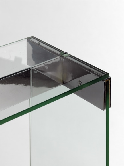 glass console in an empty room