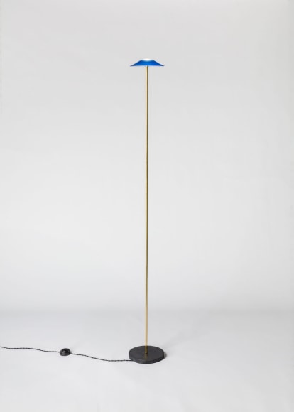 minimal lamp in an empty room