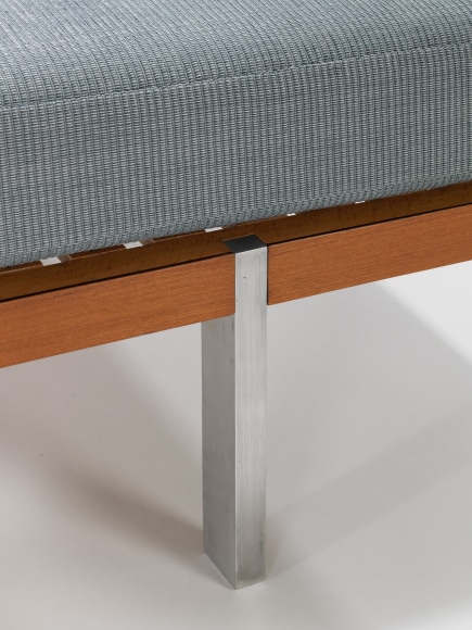 daybed in an empty room