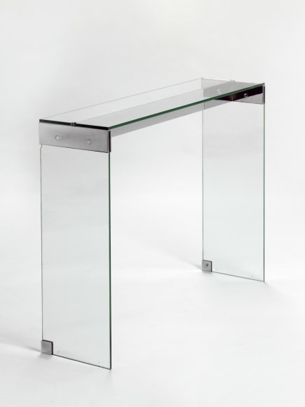 glass console in an empty room