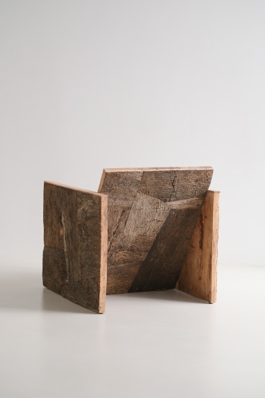 Cork and oak tree chair in a boxy shape by made in situ.