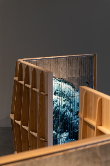 Image of Azulejos panels by Noe Mis in a room with details of ceramic and blue tiles.