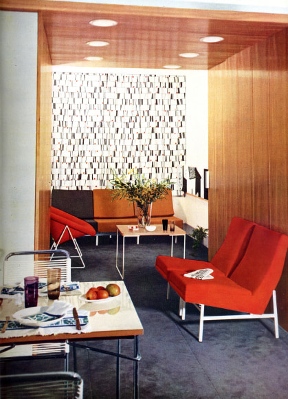 Archival image of the work by Mortier ARP with woman on sofa.