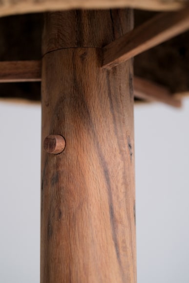 Cork and Oak floor lamp against an empty room turned off.