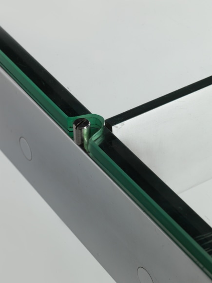 glass console in an empty room