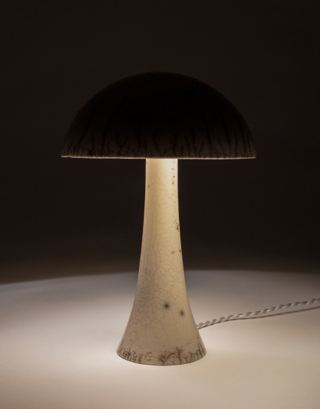 Illuminated lamp with white raku glaze