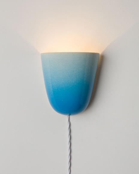 sconce on a gray wall