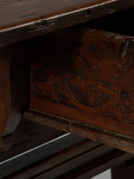 picture of medieval table in a gray room
