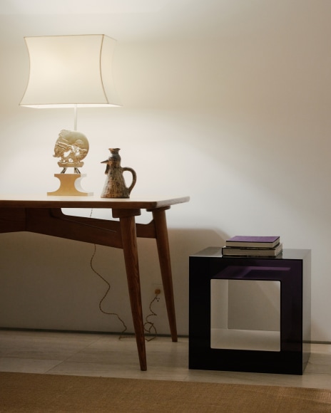 Installation view of works in the gallery, mostly furniture and some rugs and art.