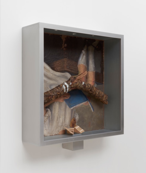 Robert Gober art work of a girl hanging upside down and reading with a branch and aluminum frame.