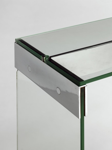glass console in an empty room