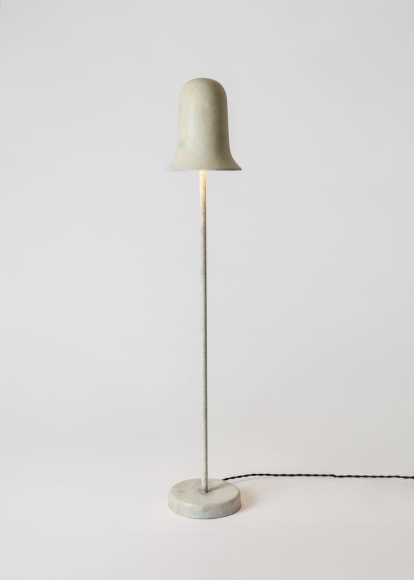 minimal lamp in an empty room