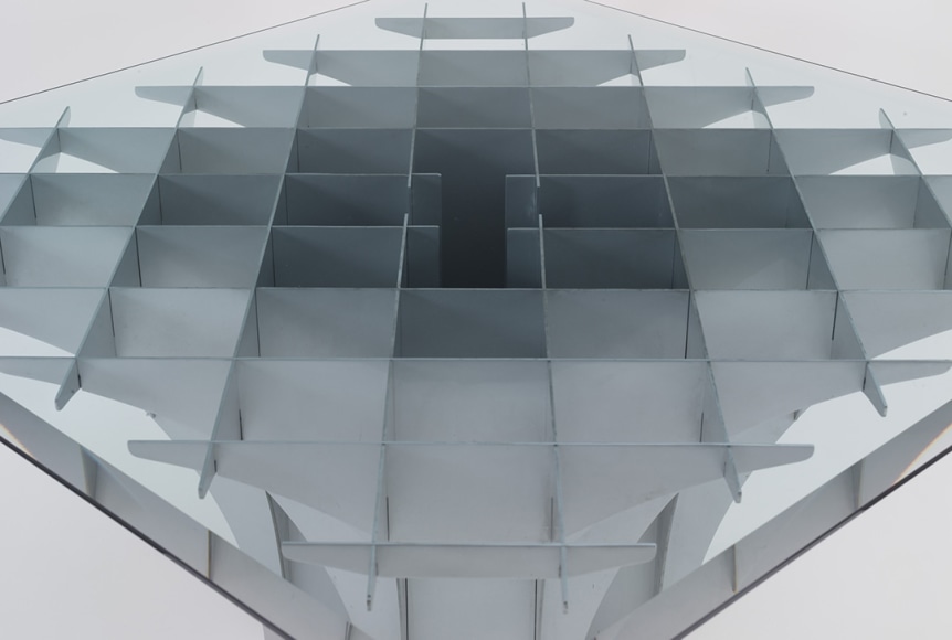 Detail of glass topped table by Pierre Paulin
