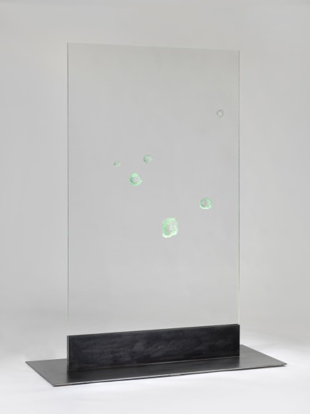 photos of a glass panel with a steel base
