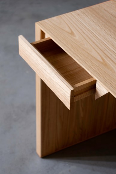 photograph of a wood desk drawer