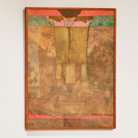 mixed media collage on a wall