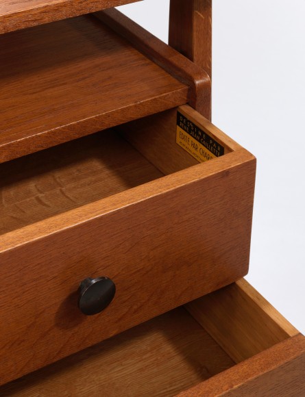 Image of desk in wood with drawers by Rene Jean Caillette. Close up detail image.