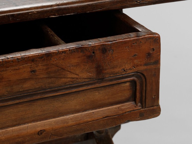 picture of medieval table in a gray room