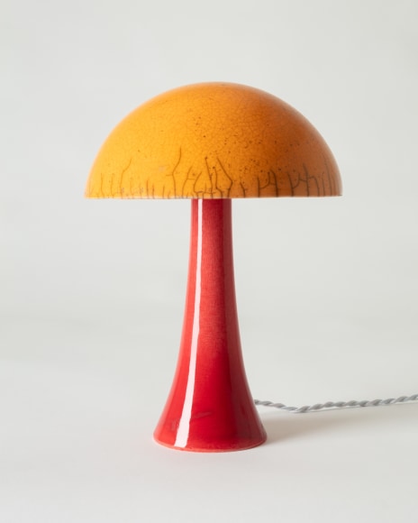 Lamp with orange raku glazed shade and red raku glazed base