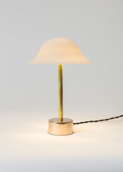minimal lamp in an empty room