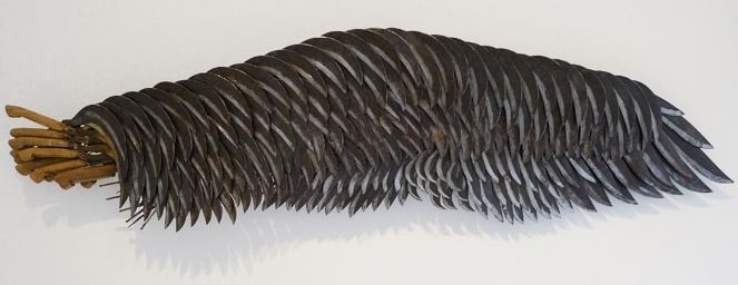 Alfredo and Isabel Aquilizan, Left Wing Albay, 2016, metal sickles with wooden handles, 86.5 x 252 cm (34.1 x 99.2 inches)