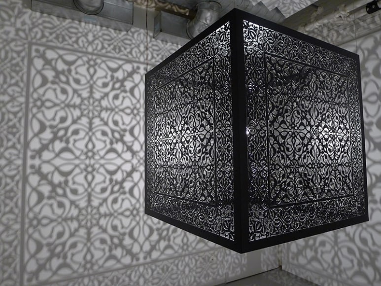Anila Quayyum Agha, Shimmering Mirage, 2016, lacquered steel and halogen bulb