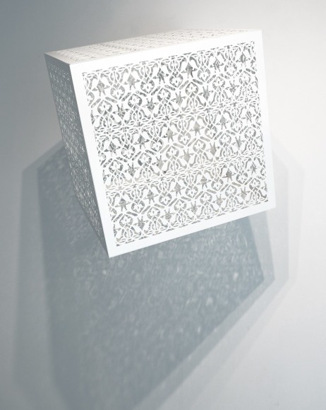 Anila Quayyum Agha, Itinerant Shadows - White (Arches), 2019, white laser-cut lacquered steel and light bulbs, 61 x 61 x 61 cm (24 x 24 x 24 inches)