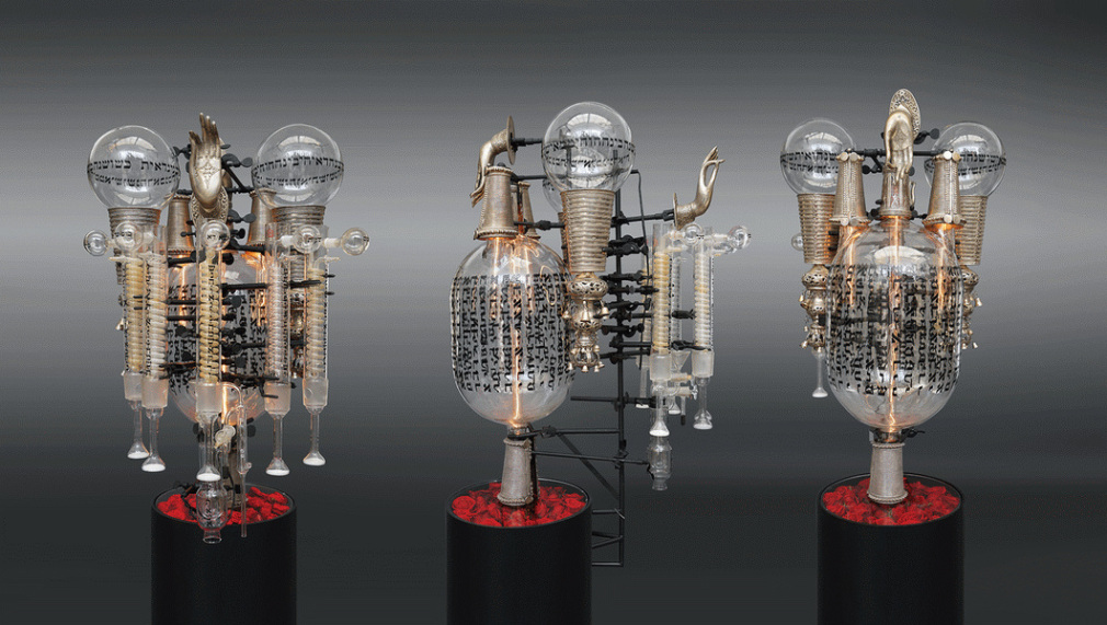 Ghiora Aharoni, What’s in the Rose? 2017, assemblage sculpture with antique silver icons and cuffs from India, antique Torah finials, fabric, vintage laboratory tubes, flasks and beakers etched with text from the Book of Genesis in Hebrew, tubular lights, steel base, 114.3 x 61 x 55.9 cm (45 x 24 x 22 inches)