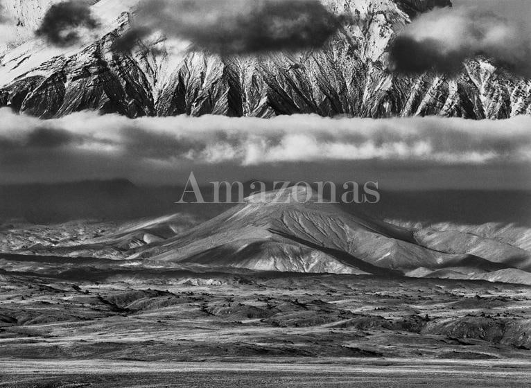 Sebasti&atilde;o Salgado. Tolbachik Volcanoe. In the background, the huge base of Kamen Volcano. Kamchatka. Russia. 2006. Gelatin silver print. 91.44 x 127 cm.