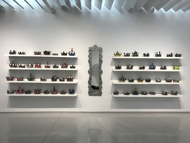 Alfredo and Isabel Aquilizan, Commonwealth: Project Another Country, 2014, recycled tin cans, mirror, text, dimensions variable