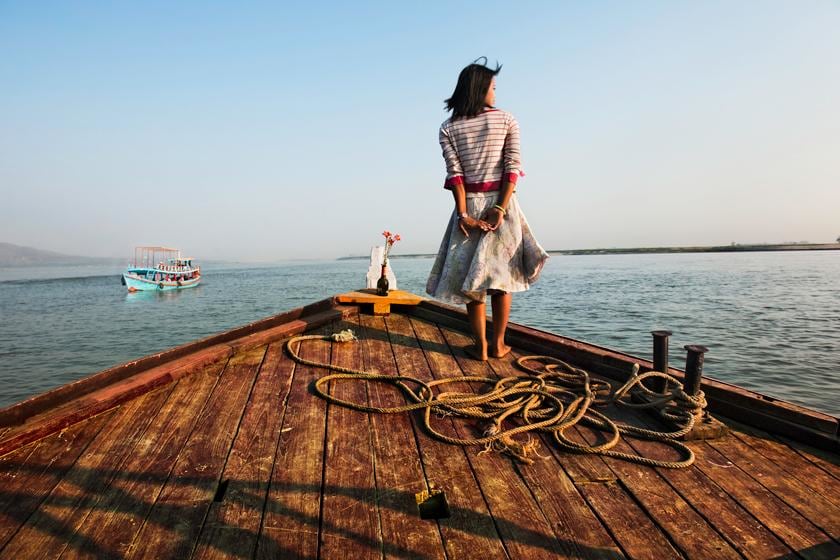 , Steve McCurry, Girl on Ship Prow, Burma, 2011, ultrachrome print, 40 x 60 inches; © Steve McCurry
