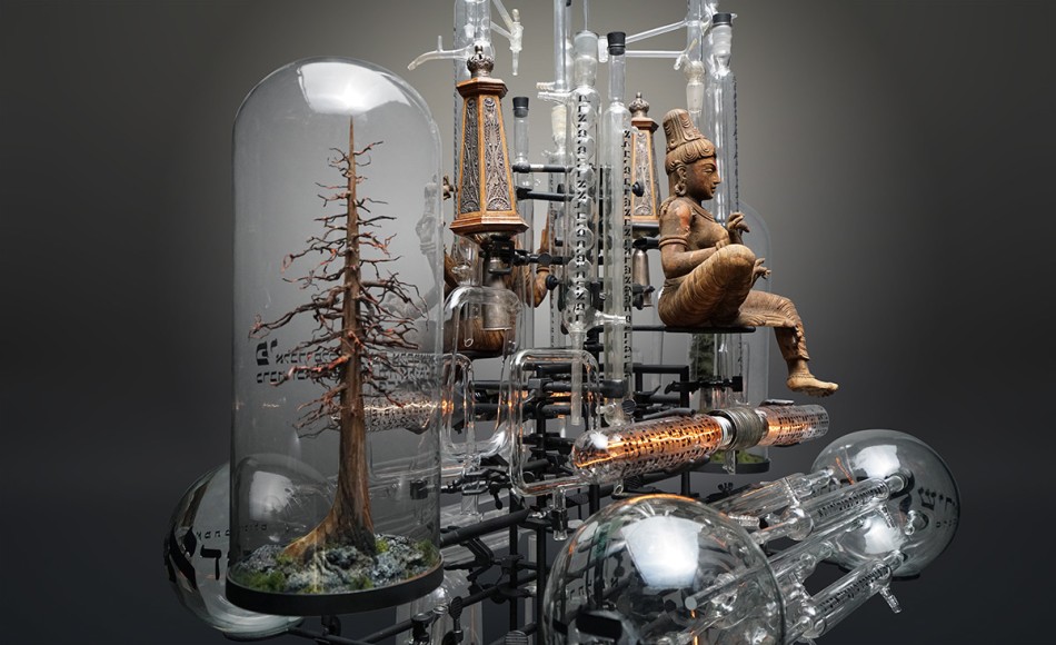 The Genesis Series - Day I B (detail), 2021, assemblage sculpture with glass beakers, tubes, flasks and domes with engraved, appliqu&eacute; and printed text; laboratory clamps; icons and iconography, tubular lights and steel base, 103 x 50 x 34 inches/261.6 x 127 x 86.4 cm