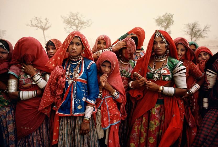 , Steve McCurry, Cluster of Women in Dust Storm, India, 1983, ultrachrome print, 40 x 60 inches; © Steve McCurry